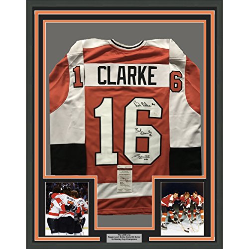 Framed Autographed/Signed LCB Line Reggie Leach, Bobby Clarke & Bill Barber 33x42 Philadelphia Orange Hockey Jersey JSA COA