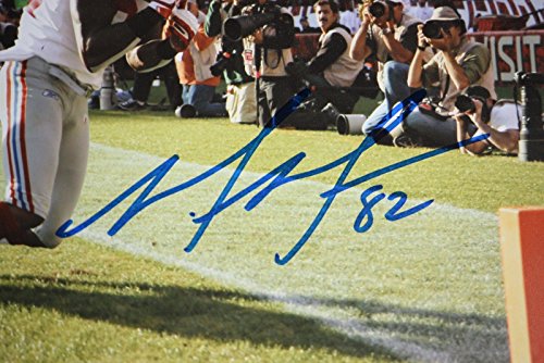 Mario Manningham Autographed 8x10 TD Catch Photo- JSA Authenticated - 757 Sports Collectibles